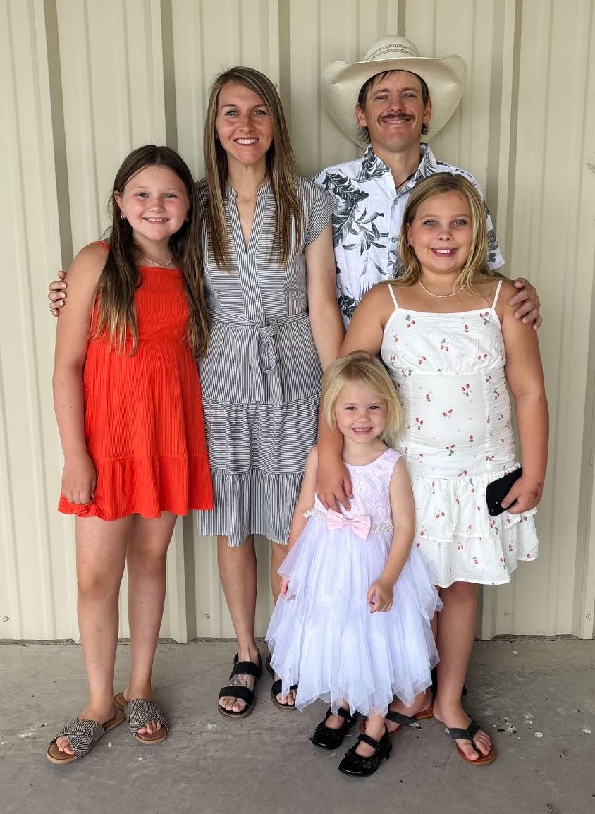 Roxy and Austin McFadden and family, owners of Hanging Feather custom screen printing and embroidery