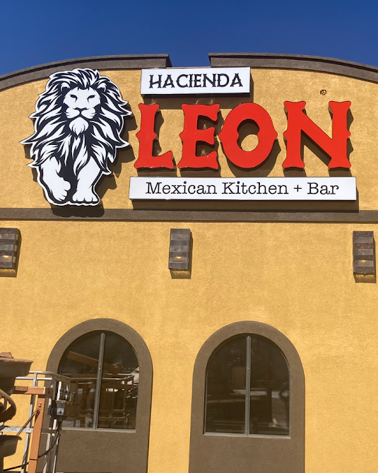 Custom dimensional storefront sign with lion logo for Hacienda Leon Mexican Kitchen + Bar in Dublin, TX
